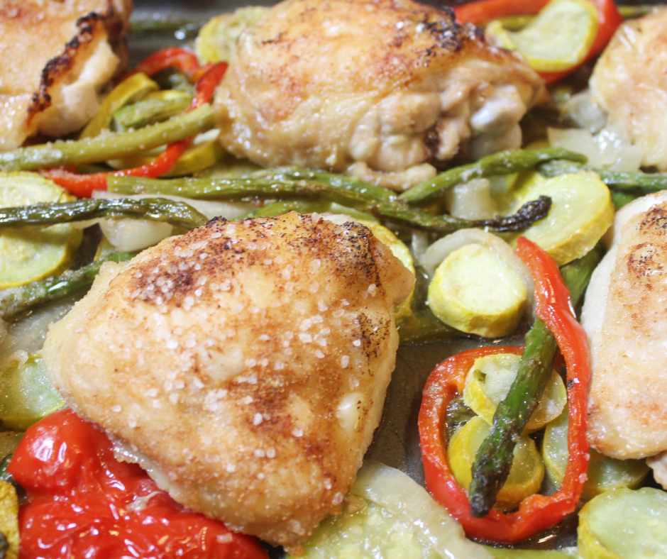A delicious Sheet Pan Meal with roasted Chicken Thighs and Veggies
