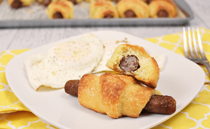 Plated Low Carb Sausage Rolls with fried eggs.