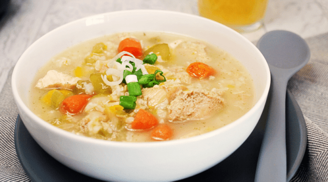 Bowl of Creamy Instant Pot Chicken and Rice Soup #lowfat #dairyfree #thmemeal #easysoup #instantpotsoup