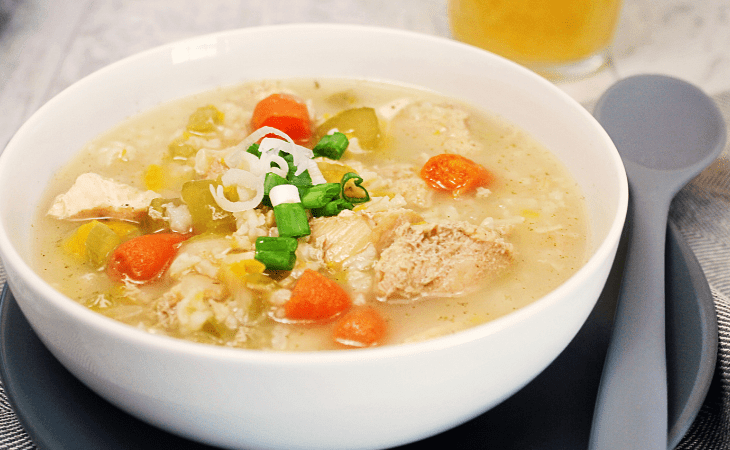 Bowl of Creamy Instant Pot Chicken and Rice Soup #lowfat #dairyfree #thmemeal #easysoup #instantpotsoup