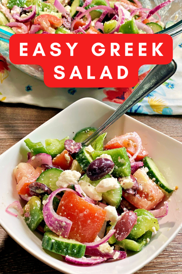 Greek salad in a white bowl with title for pinning on Pinterest.