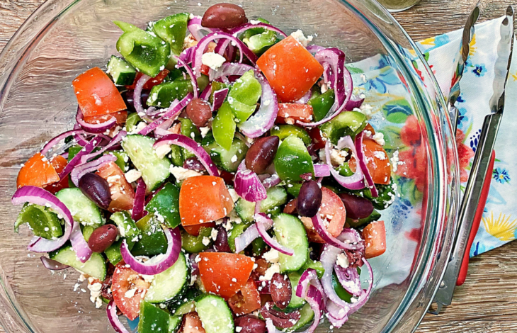 A picture of a large bowl of Greek salad.