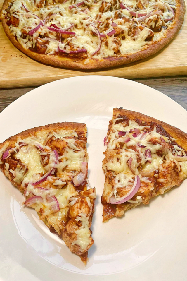 Two slices of BBQ Chicken Pizza on a white plate.