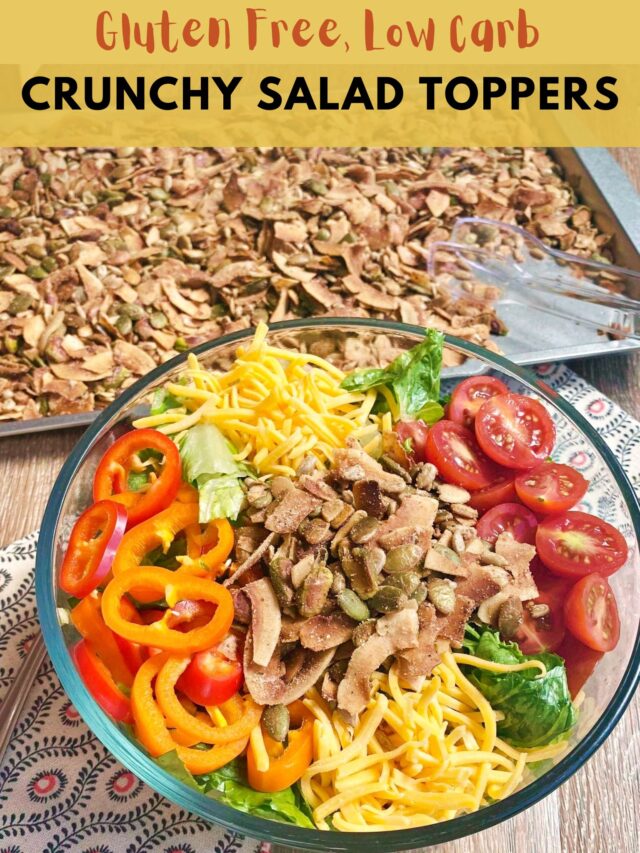 A photo of a large salad with colorful veggies in a bowl topped with this savory salad topper mix.